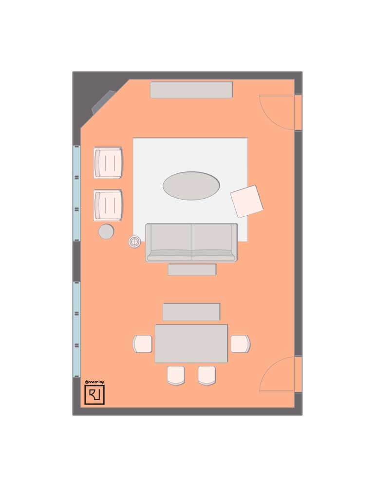 Combined living room dining room layout with corner fireplace.