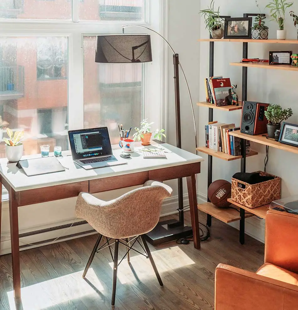 Desk in front of the window with natural light.