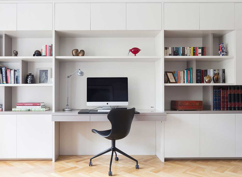 Wall-mounted shelves with desk.