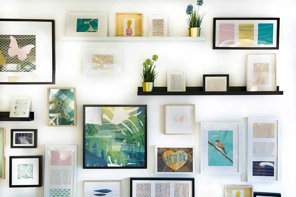 Artwork gallery wall sample with mixed frames.