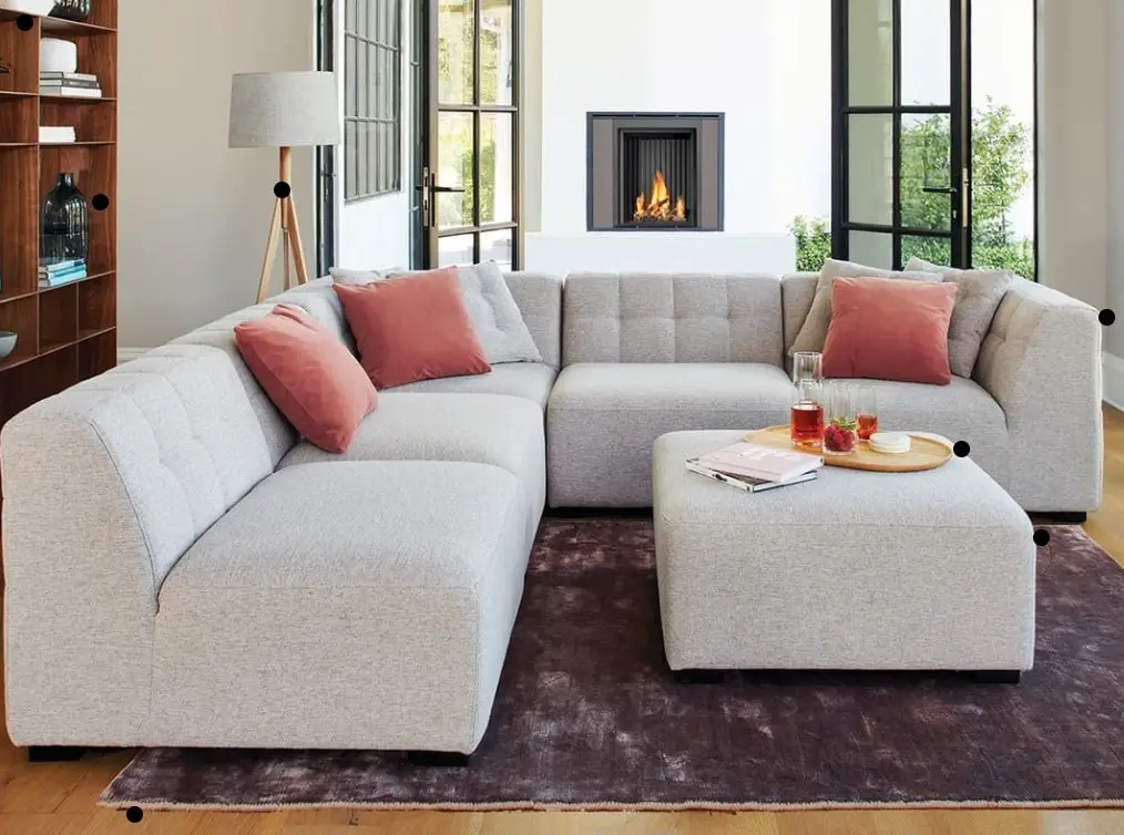 Sectional sofa with pouf