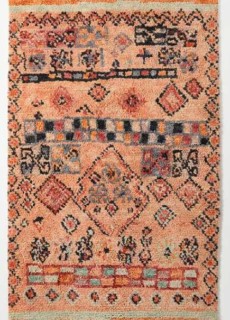 orange hand tufted rug